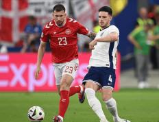 IM体育-包含丹麦队大胜，轻松闯入淘汰赛的词条